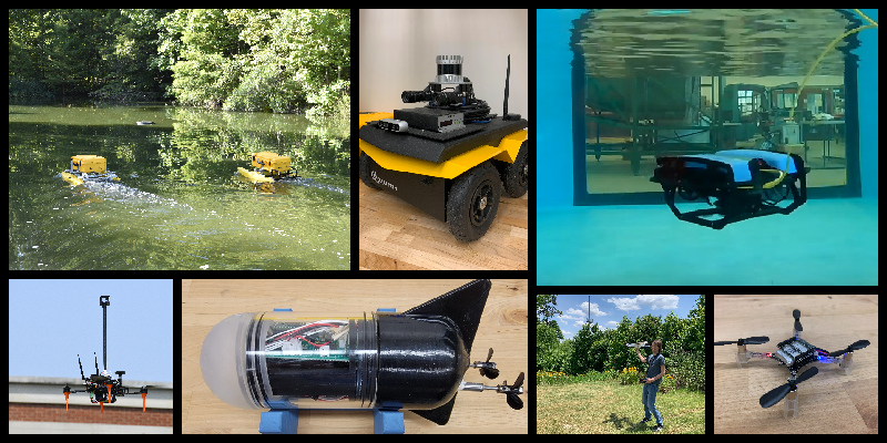 Six of the lab's vehicles: two yellow autonomous surface vessels on a pond, a Clearpath Jackal ground robot, an underwater ROV in the water tank, a quadrotor with a wind-sensing mast, the MiniUUV underwater vehicle, and a researcher flying a small fixed-wing UAV.